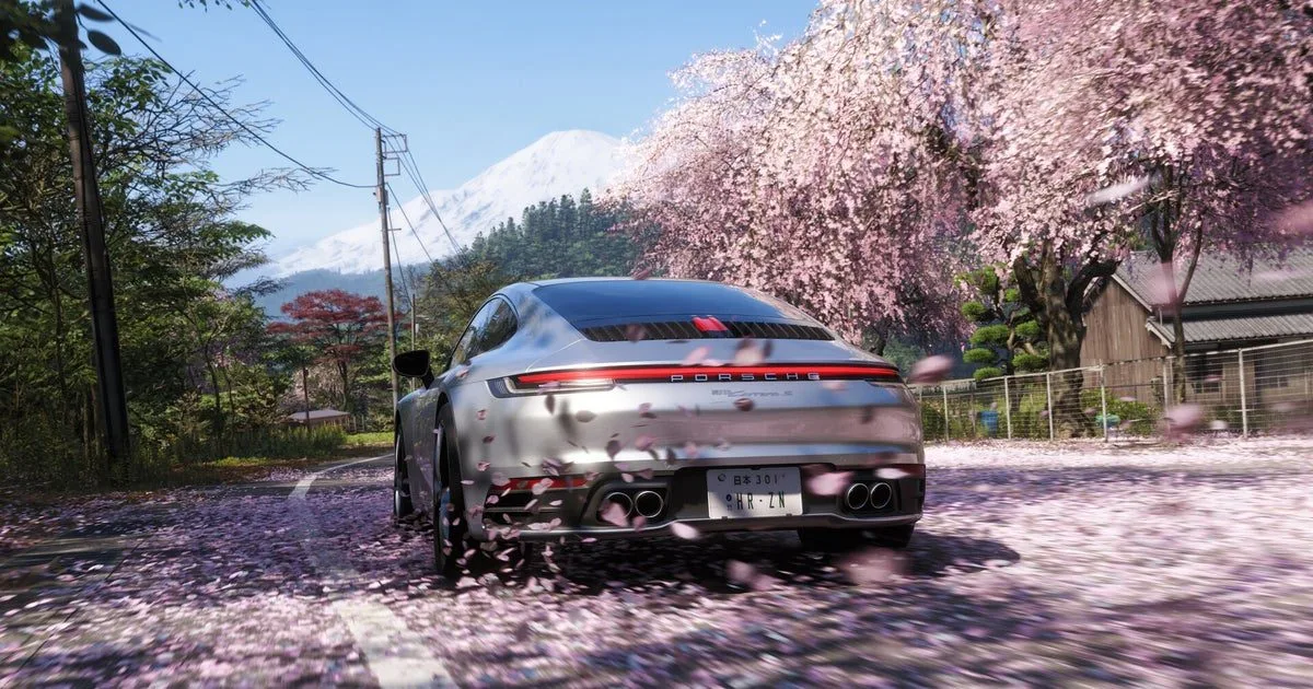 Forza Horizon 6 Mount Fuji rally stage with a snow-covered road and a Subaru rally car mid-drift